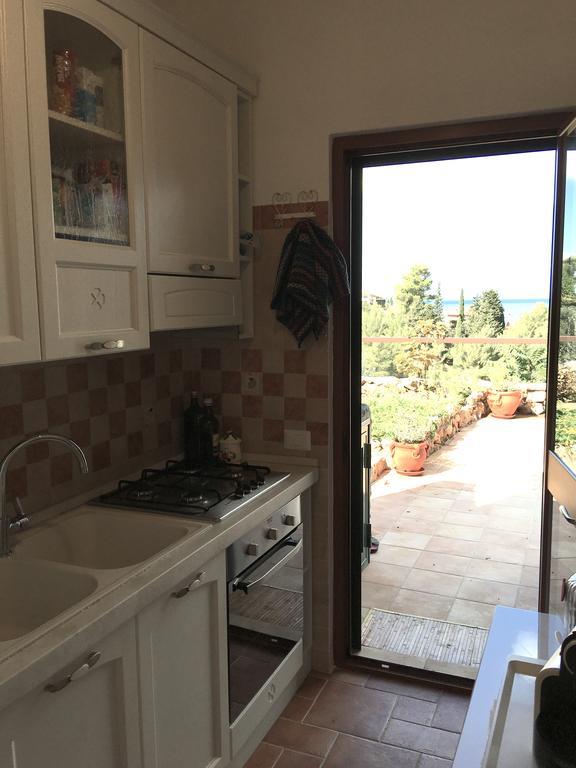 Апартаменты Casa Azzurra Порто Санто Стефано Экстерьер фото