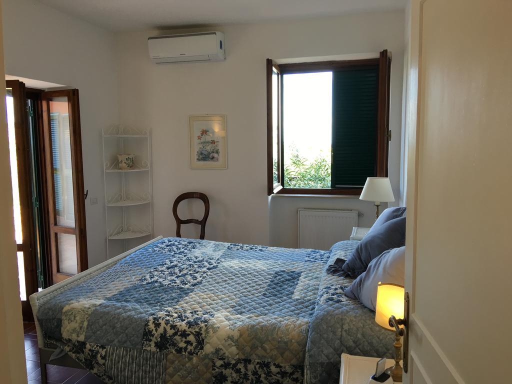 Апартаменты Casa Azzurra Порто Санто Стефано Экстерьер фото